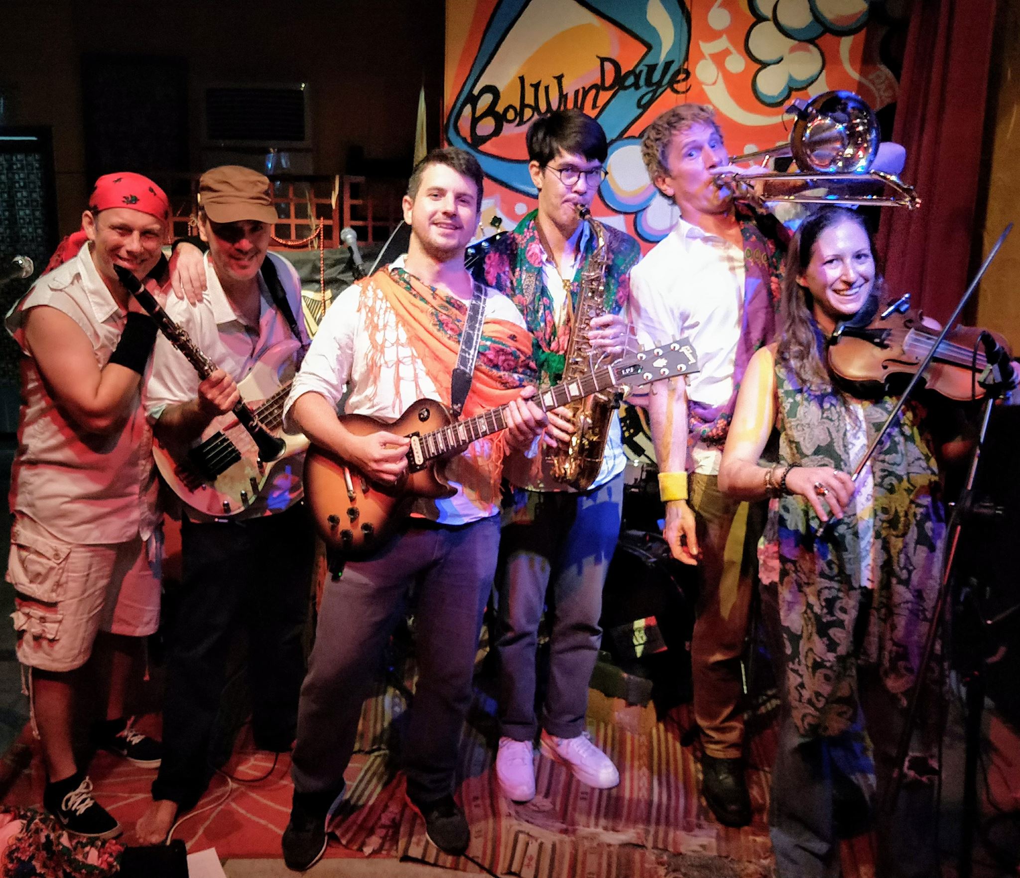 Balkazar band members and friends together after a show